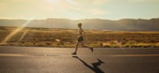 Man running outdoors during a 30-day cardio challenge